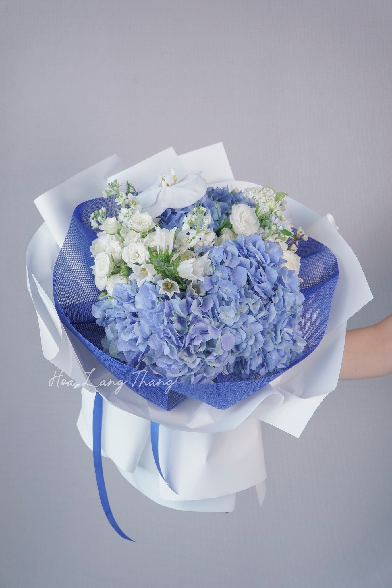 Bó hoa xanh với hoa <a href=