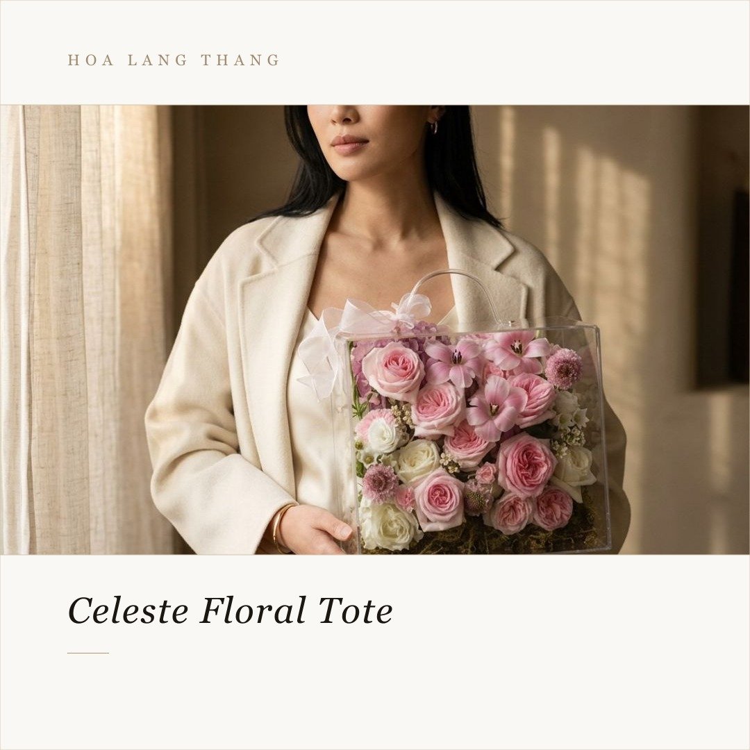 Bó hoa hồng và lan hồ điệp màu hồng tinh tế trong túi hoa Celeste