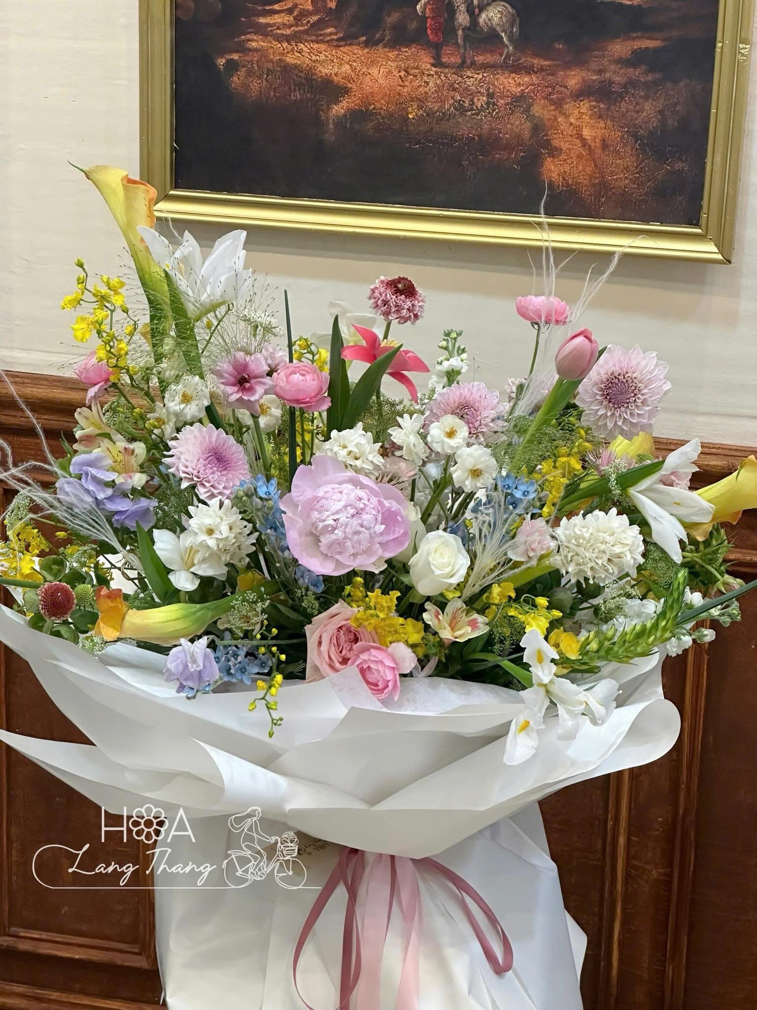 Bouquet mixed with tulip, rose, and ly on white background, elegant arrangement